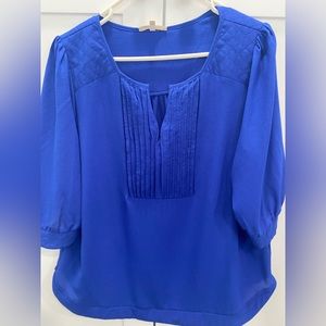 41 Hawthorn royal blue blouse with quilted detail.